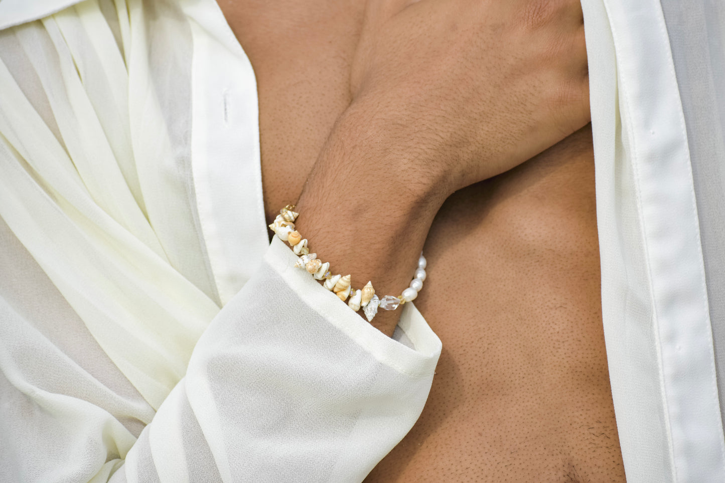 Puka shells, freshwater pearls, and Swarovski Crystal and bracelet set ￼